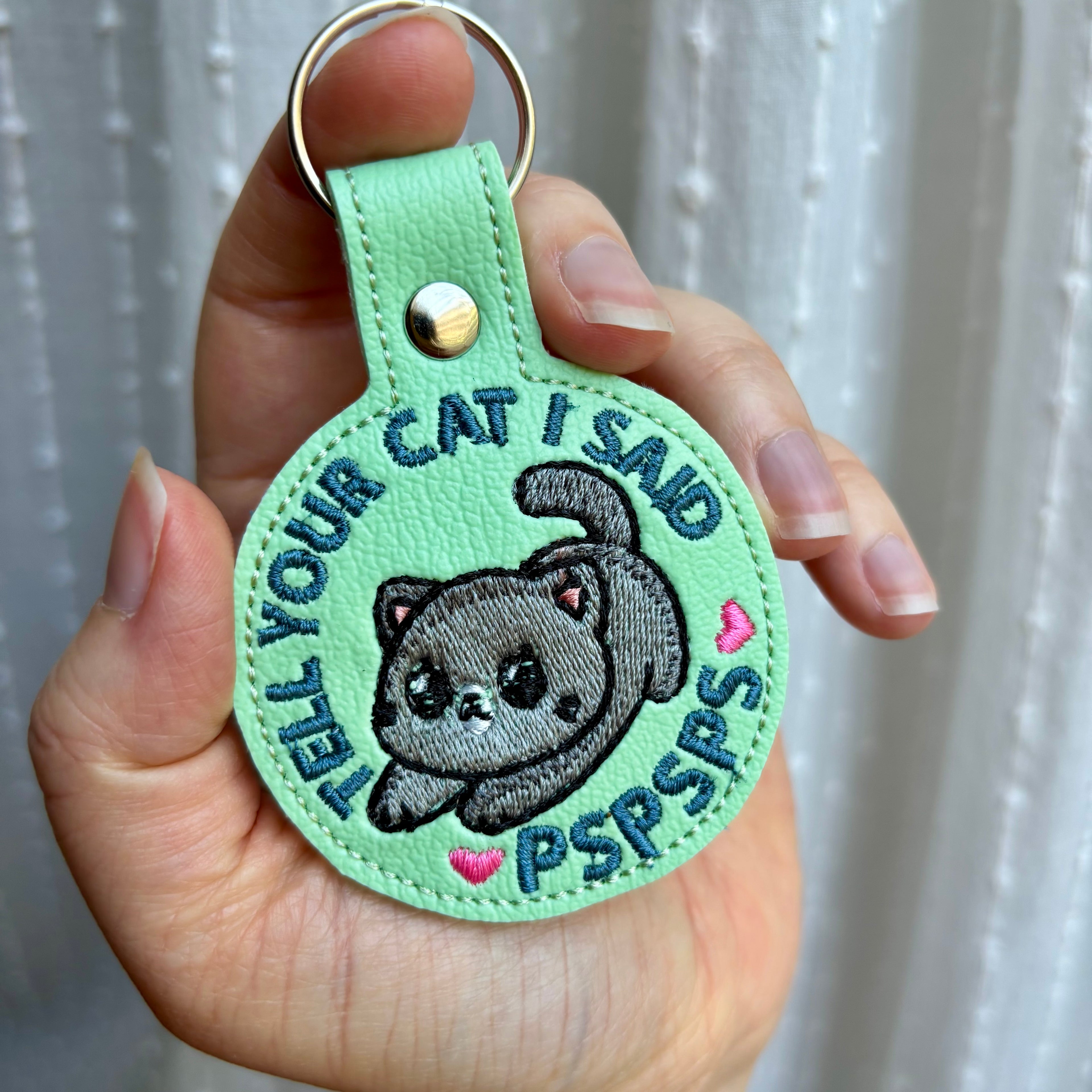Tell Your Cat Keychain