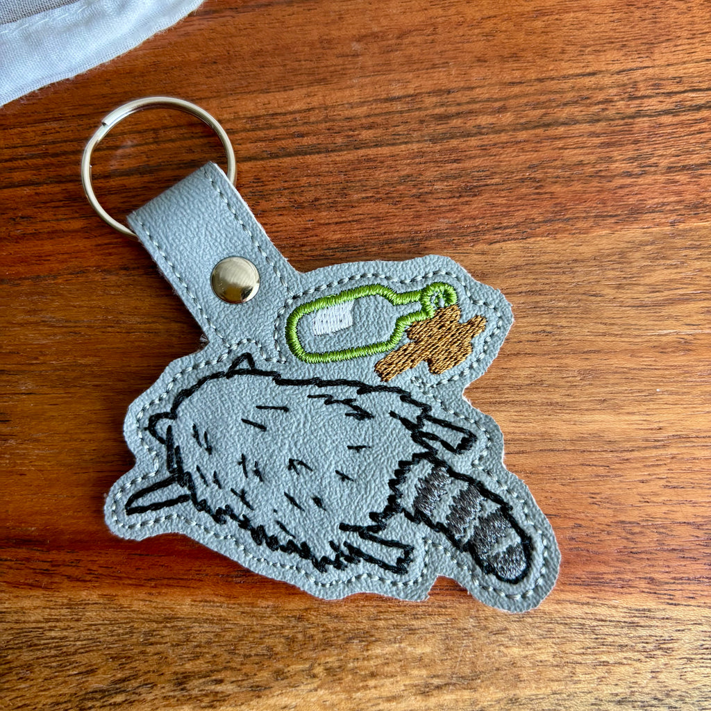 Drunk Raccoon Keychain
