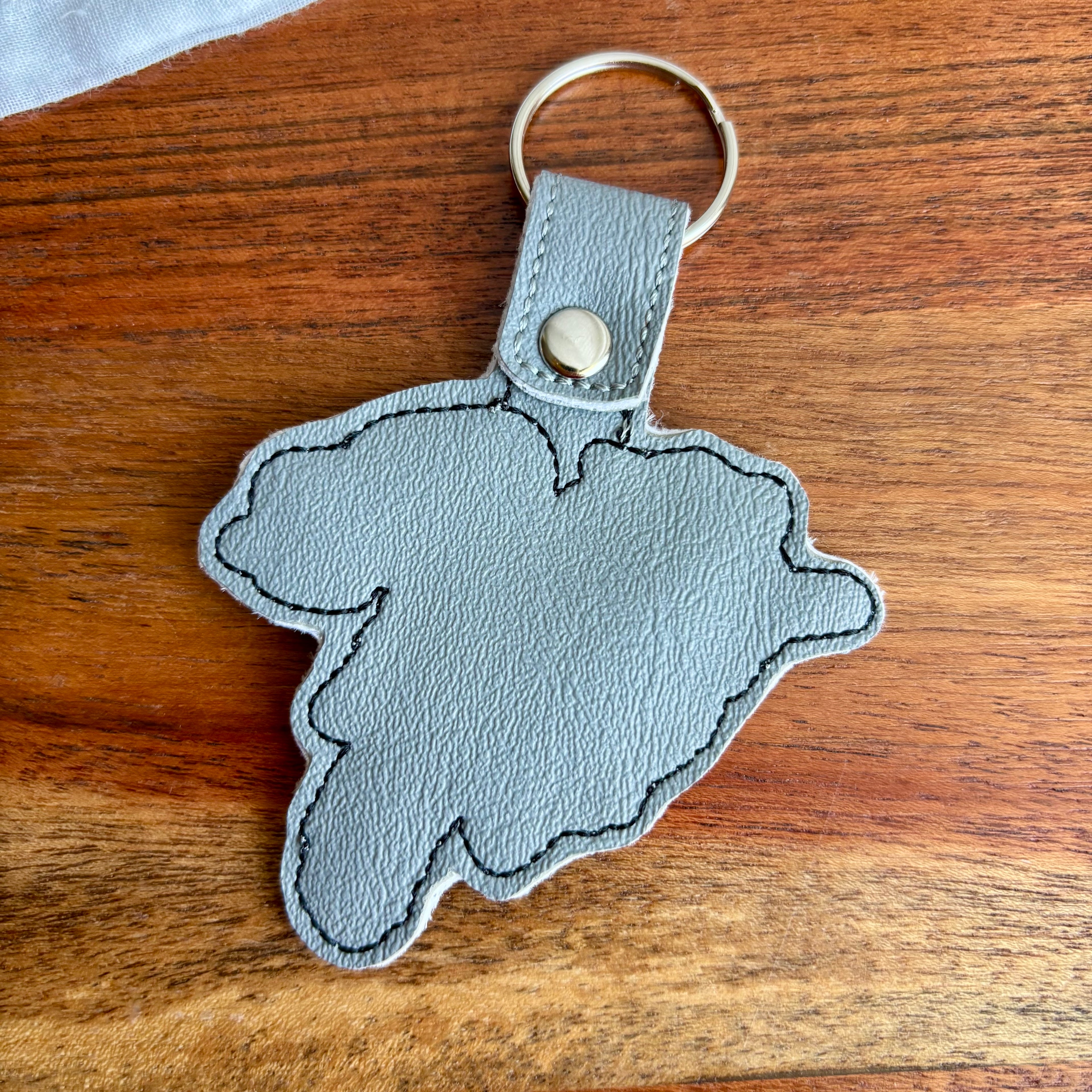 Drunk Raccoon Keychain